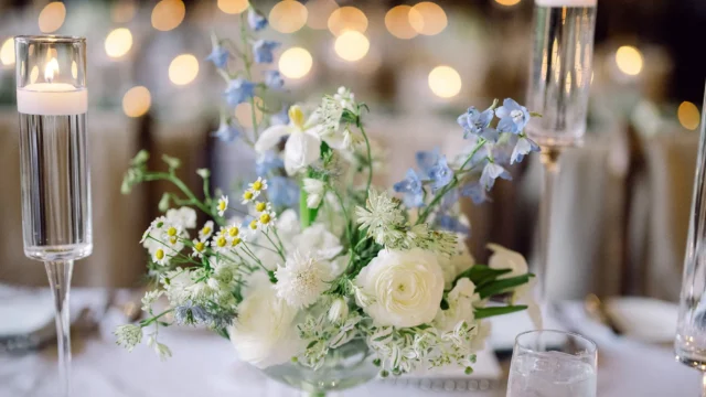 Elegant wedding venue in Vail featuring floral installations, custom draping, and ambient lighting designed by Rose Petals.
